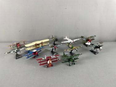 Group of Die-Cast Airplanes with Stands