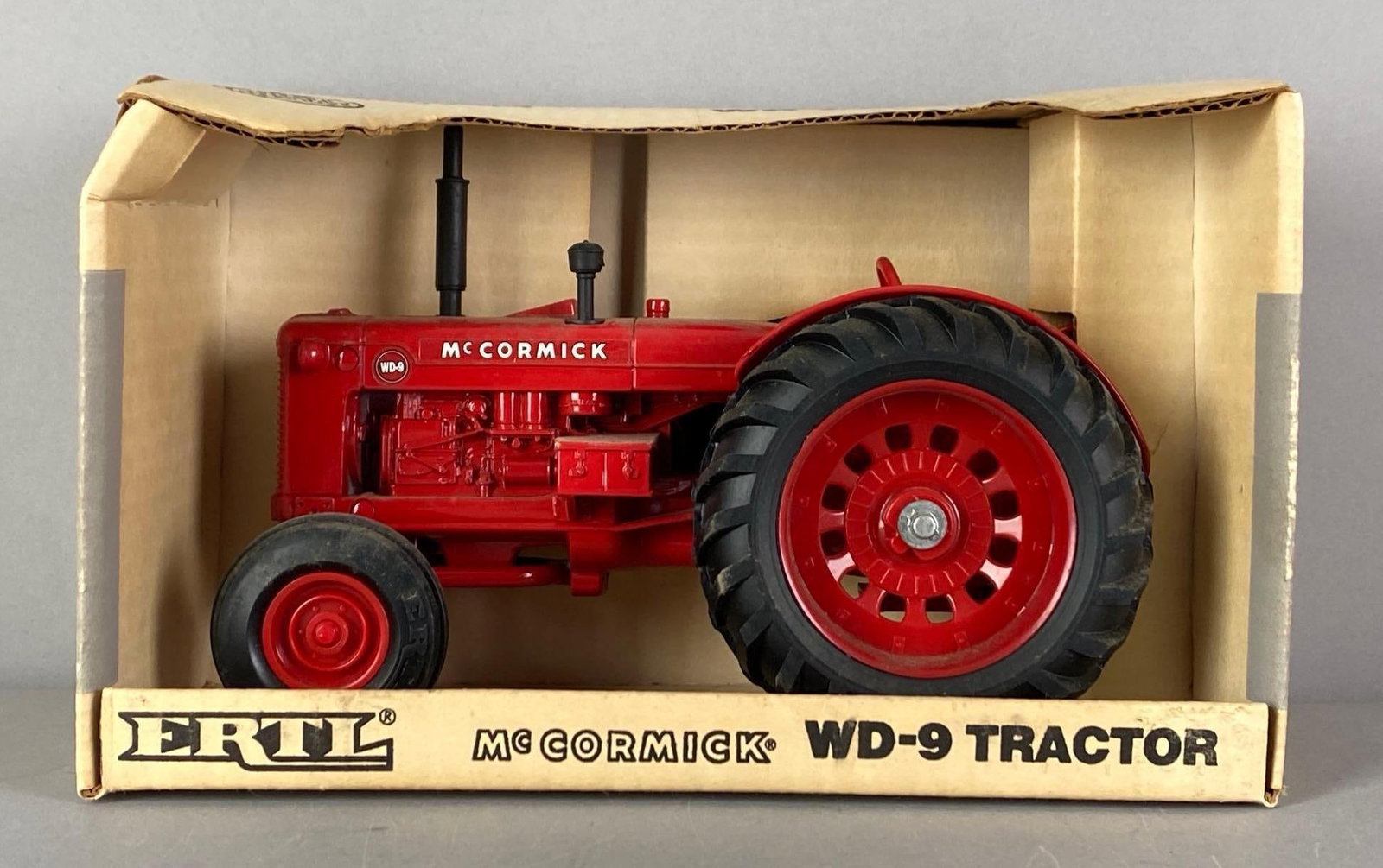 ERTL McCormick WD-9 Die-Cast Tractor: 1/16 scale, in original box