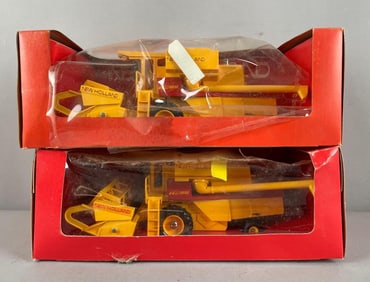 Group of 2 New Holland TR 85 Plastic Combine Harvesters