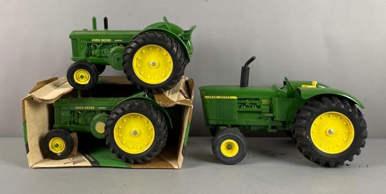 Group of Ertl John Deere Pressed Steel Diesel Tractors