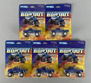 Group of Ertl Bigfoot Die-Cast Monster Trucks