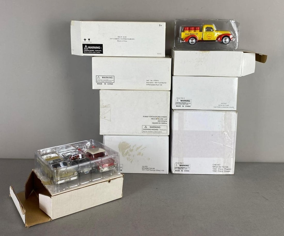 Group of 8 1:32/1:24 Die Cast Vehicles: Includes 1911 Ford Town Car, 1932 Chevy Phaeton, and more. New in original packaging. Largest item measure H 3 x W 7 x L 7 inches.