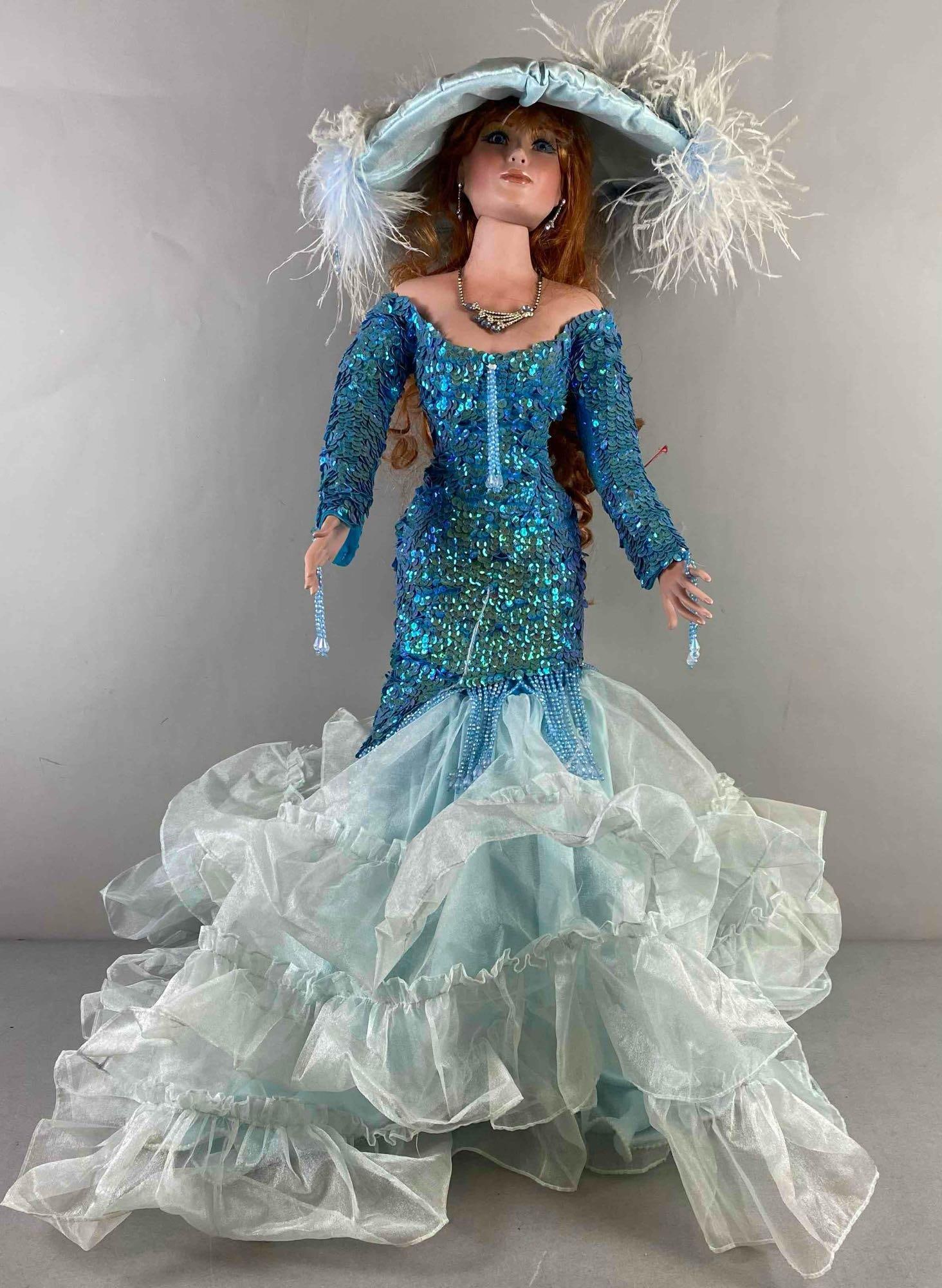 Aruba 34?? Porcelain Adult Doll By Rustie: Limited Edition of 200 made. 34 inches tall. Some small stains on dress. Comes with stand.