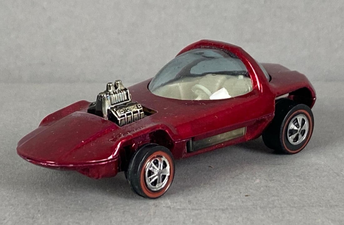 1967 Mattel Hot Wheels Redline Silhouette: die-cast, redline tires, clear windows, red, minor scratch on front and back bumper, front wheels slightly bent