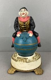 Replica of Original of James D Caprom Collection Clown on Globe Cast Iron Bank