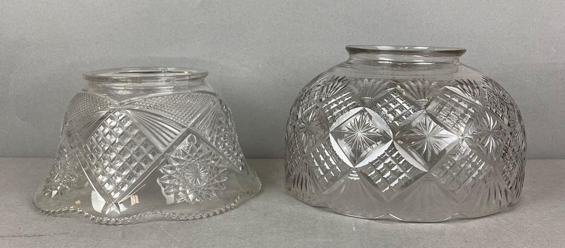 Group of 2 Crystal Light Shades: One is cut and one is pressed. Largest Fitter measures 3 3/4 inches. Larger shade measures H 5 xW 8 x D 8 inches.