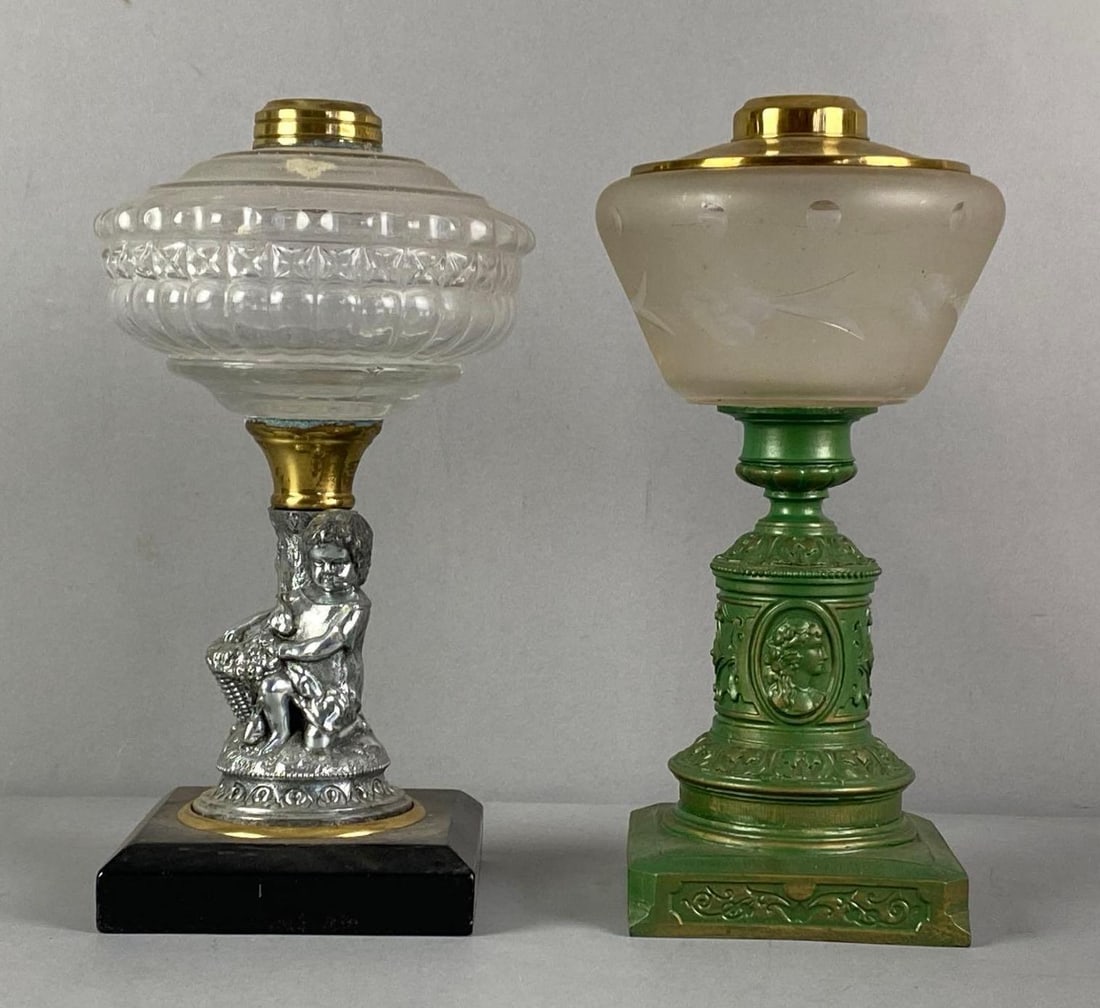 Group of 2 Antique Victorian Oil Lamps: Missing wicking hardware, largest measures 11” H x 5” W