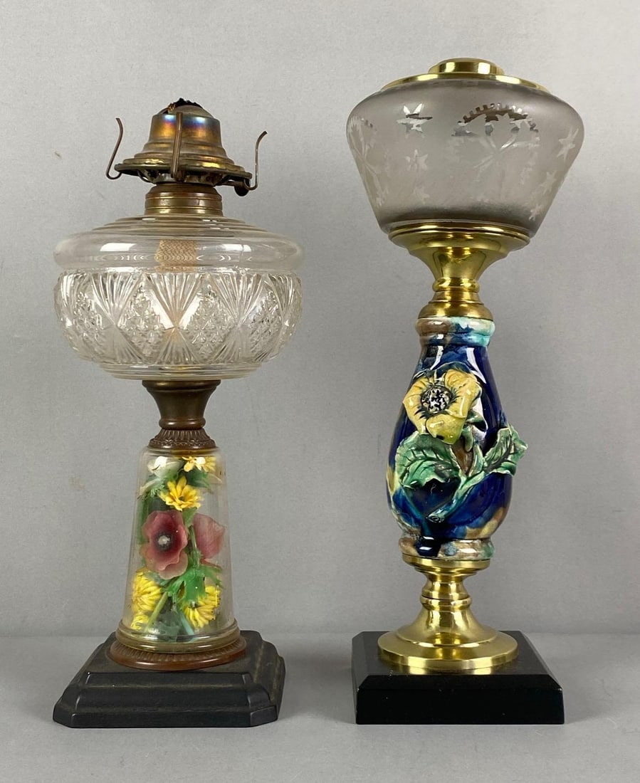 Group of 2 Antique Victorian Floral Art Column Oil Lamps: Largest measures 14 1/2” H x 5 1/2” W x 5 1/2” D
