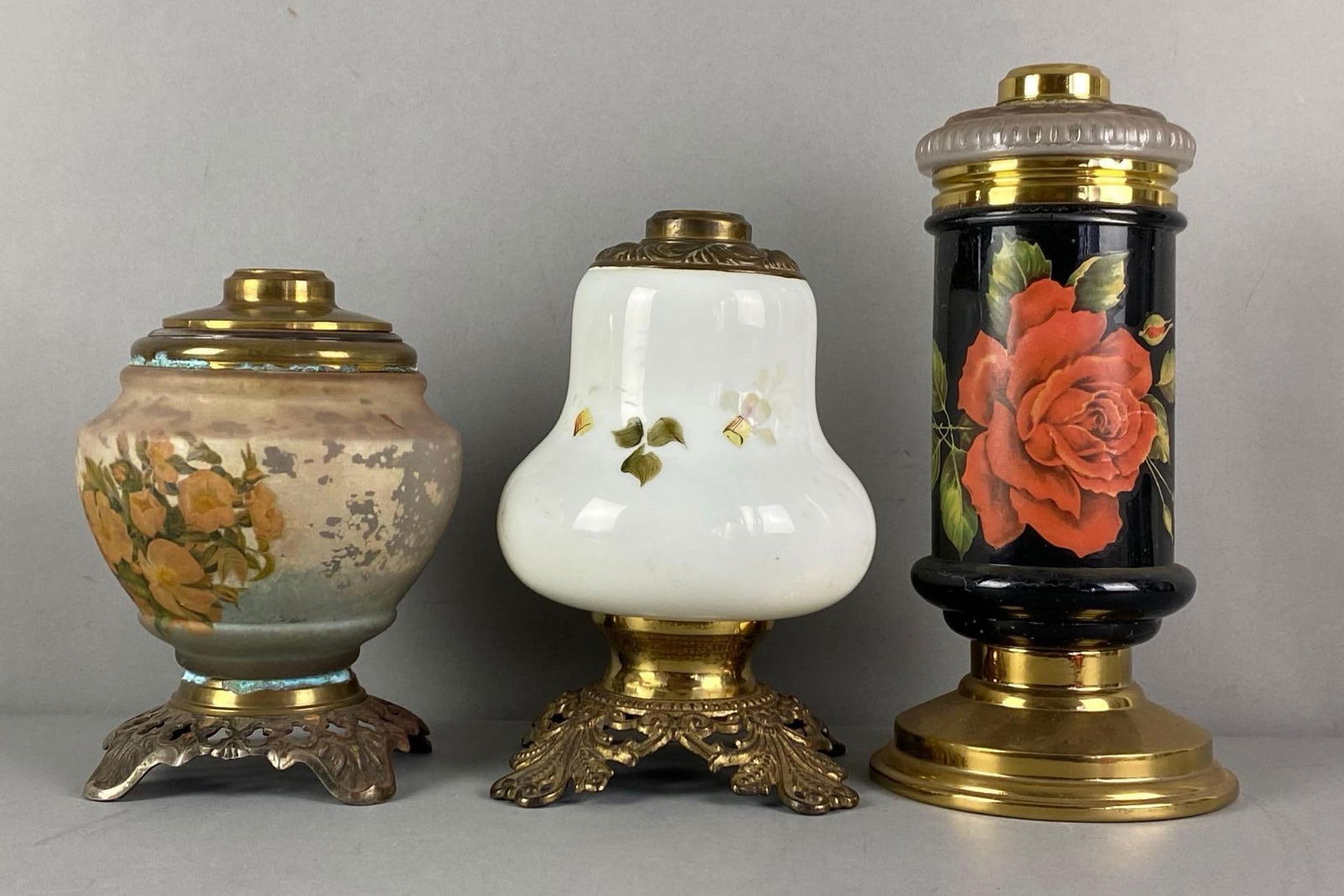 Group of 3 Antique Victorian Oil Lamps: Missing wicking hardware, largest measures 11 1/2” H x 5 1/2” W x 5 1/2” D