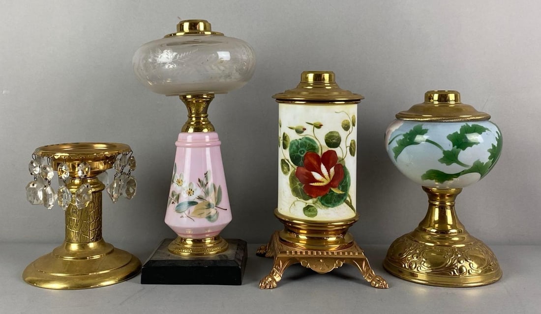 Group of 4 Antique Floral Oil Lamps: Largest measures 12 1/20 H x 6” W x 6” D