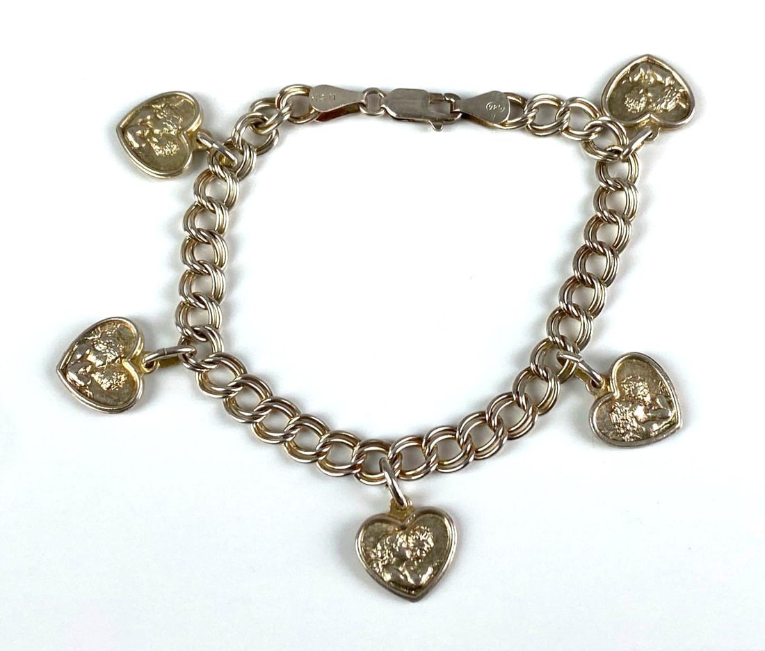 Sterling Silver Cupid Heart Charm Bracelet: Measures 6 1/2” In length