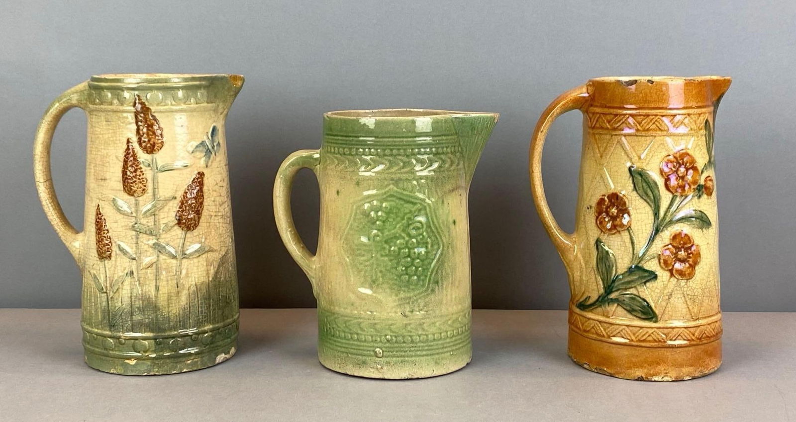 Group of 3 Antique Roseville Floral Stoneware Pitchers (1 of 3)