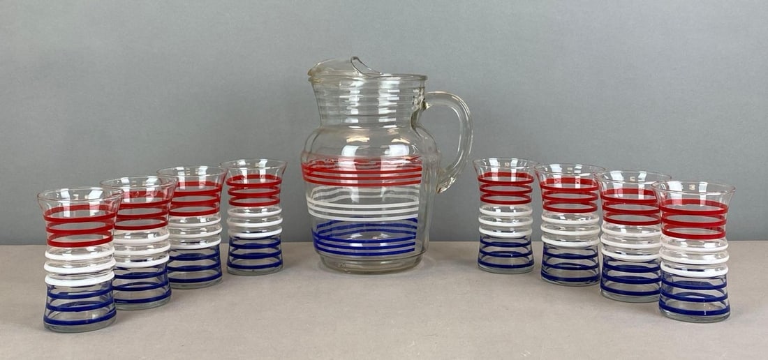 MCM Anchor Hocking Red White and Blue Pitcher and Tumbler Set: Mid century modern, needs cleaning, pitcher measures 9 1/2” H x 8” W x 6 1/2” D