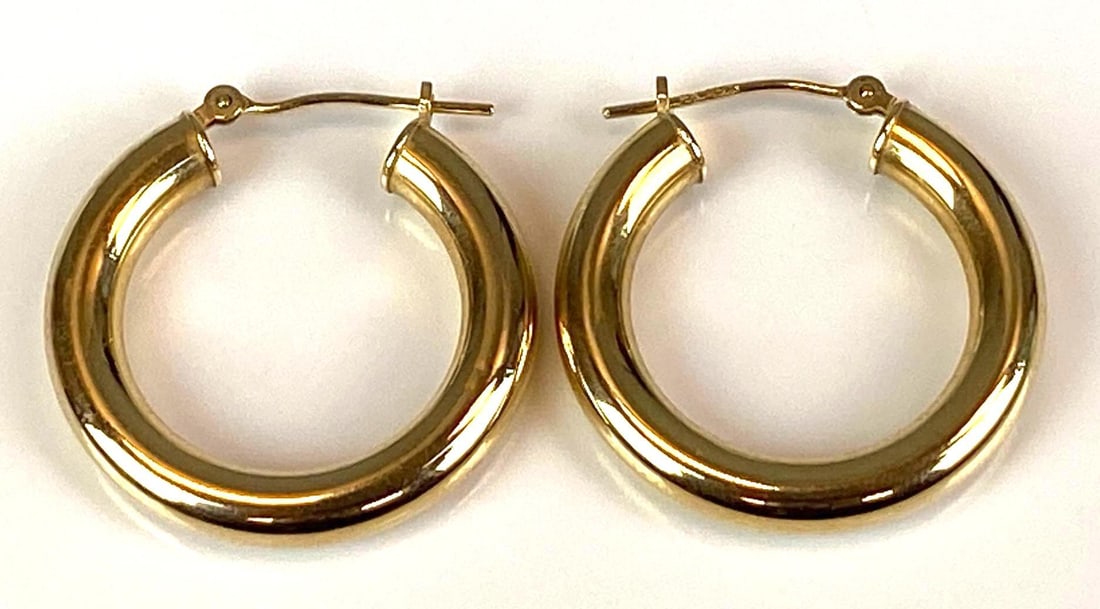 Pair of 14K Yellow Gold Round Tube Earrings: Total weight of 1.8 grams, each measures 1 1/4” H x 1” W