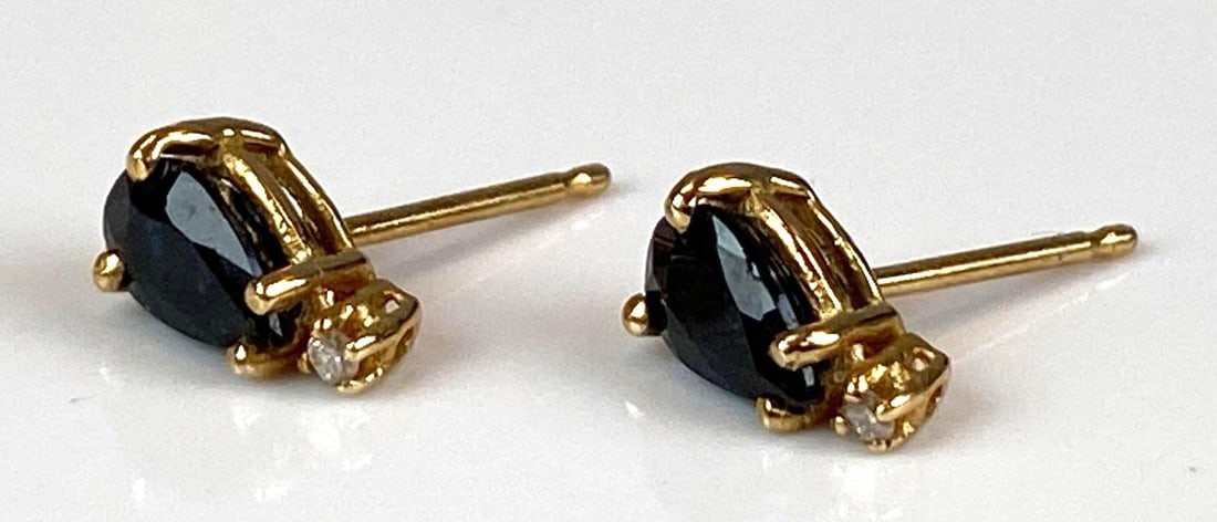 Pair of Signed CCC 14K Yellow Gold Sapphire Diamond Stud Earrings: Total weight of 0.9 grams, missing backs, each measures 1/4” H