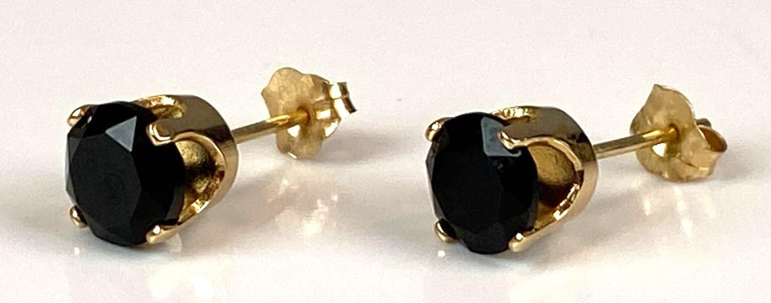 Pair of Signed AFJC 14K Yellow Gold Onyx Stud Earrings: Total weight of 1.1 grams, measures 1/2” In length
