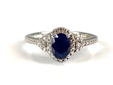 Signed STS Sterling Silver Sapphire and White Topaz Ring