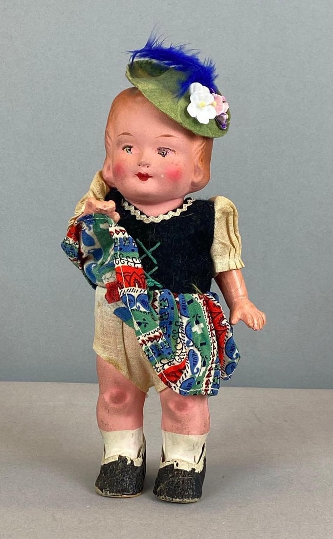 Vintage German Wind Up Doll: In working condition, Includes key, measures 8” H
