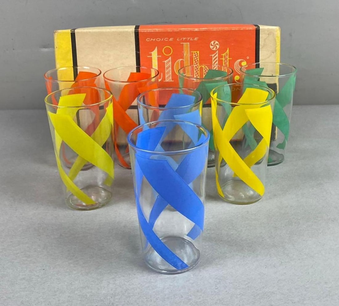 Group of 8 Vintage Mid-Century Swirl Strip Highball Glasses: Comes with its original packaging. Measures 5 inches tall.