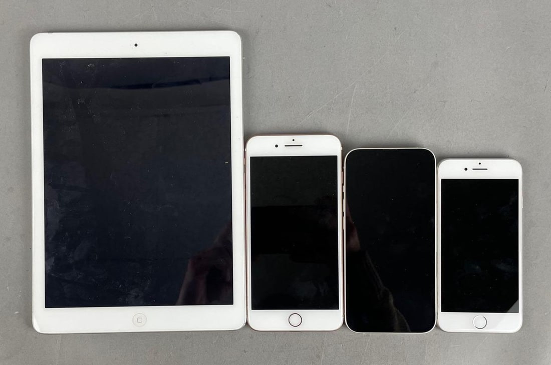 Group of iPhones and iPad: Includes model A1474 iPad Air,, iPhone 13, 7, all took a charge
