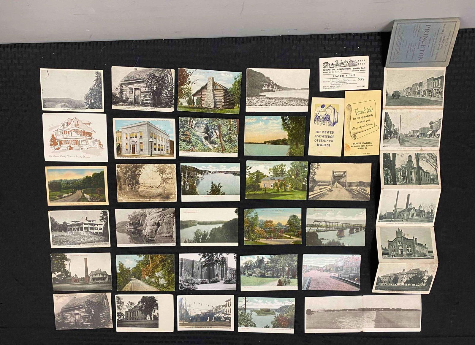 Group of 32 Vintage Illinois Postcards: Includes historical places in Dixion, Princeton, Joliet, Marseilles, and more. Largest postcard measures L 11 x W 3 1/2 inches. Circa 1920’s.