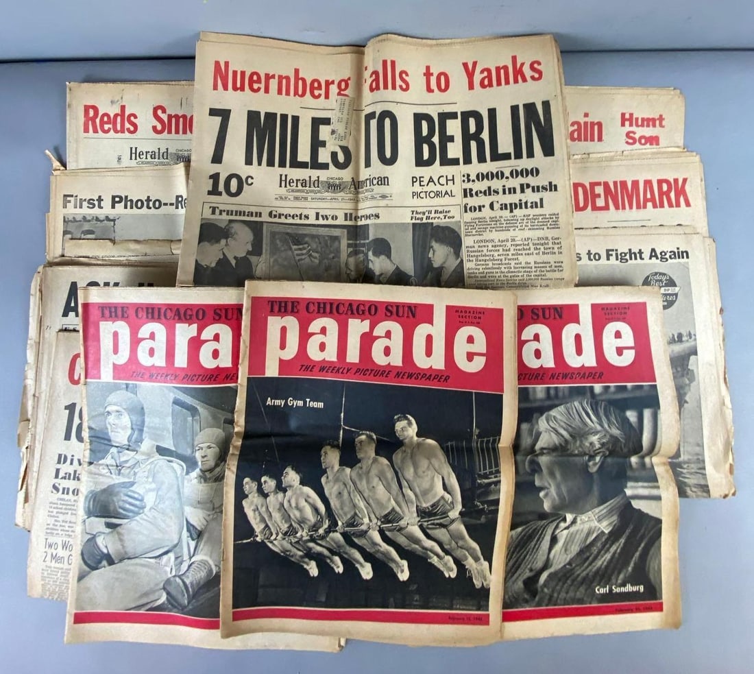 Group of 14 WW2 Herald American Newspapers: Circa April and May of 1945. Rips and Tear through. Highlights key moments in the pacific and battles in Berlin. Rips and tears throughout as well as creases. Measures 17 in length.