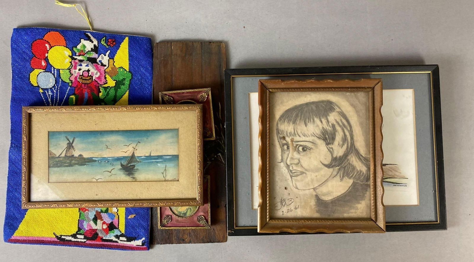 Group of 7 Assorted Pictures Frames and More: Includes Knitted Clown, lake, and more. Largest measures L 17 x W 13 inches.