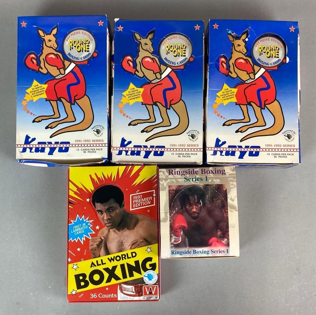 Group of 1990s Boxing Trading Cards: all boxes and Packs opened, Inclufes various cards and empty Packs, largest box measures 9” H x 5” W x 2” D