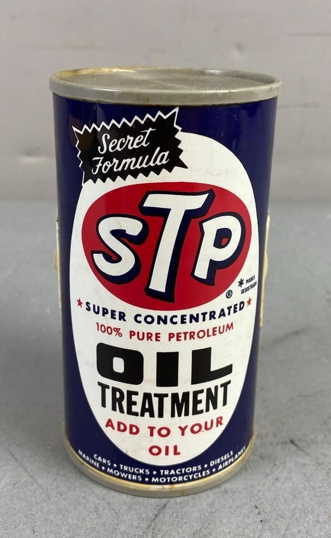Vintage General Electric STP Oil Can Transistor Radio: Tested and working. Made in Hong Kong, China. Measures L 5 x W 2 1/2 inches.