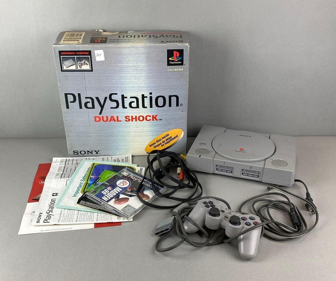 Sony PlayStation Dual Shock Game Console: Untested. Unknown set completion. Includes original box, 1 controller, Madden 99 and more. Box measures H 12 x W 13 x D 4 1/2 inches