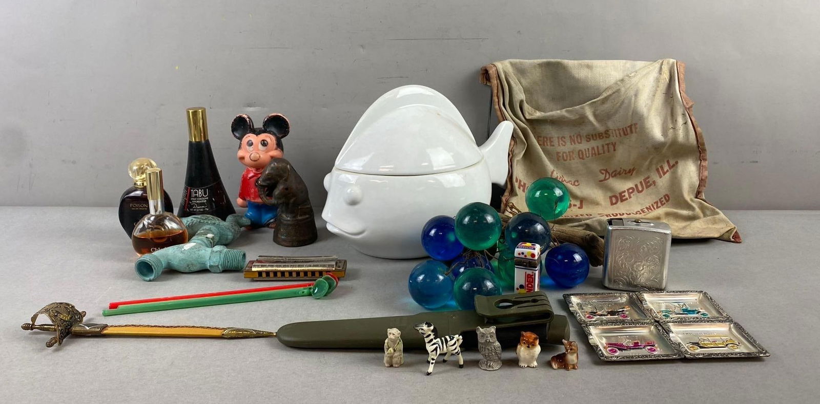 Group of Assorted Items: Includes perfumes, morakniv knife, fish jar measures 7 1/2" x 11" x 7"