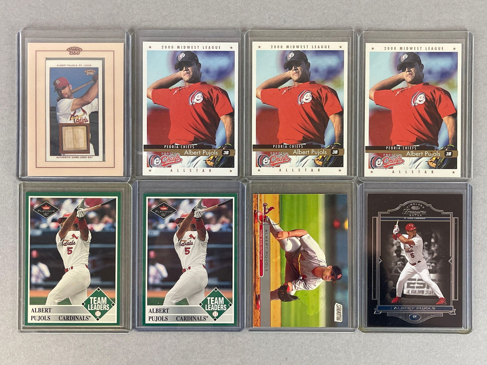 8 - 2000 - 04 Albert Pujols Cards with Relic and Serial Number (1 of 2)
