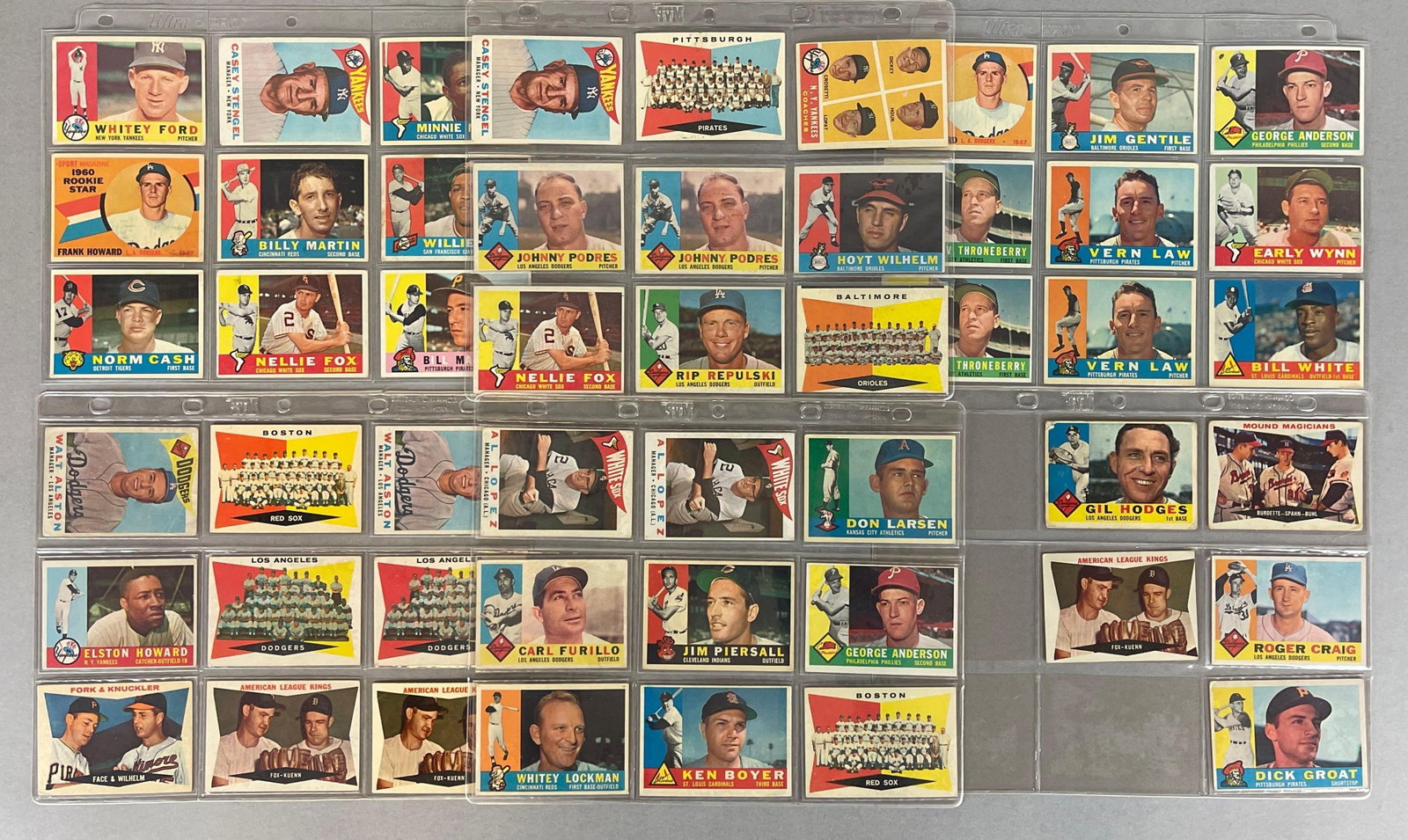 50 - 1960 Topps Baseball Cards with HOFs, Stars, and Rookies: Conditions vary, Low - EX, Includes Willie Mays, Whitey Ford, Nellie Fox, Minnie Minoso, and More