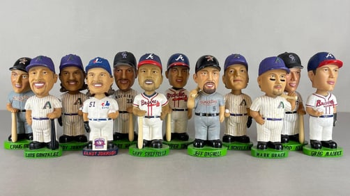 12 - Baseball Bobbleheads with Greg Maddux, Randy Johnson, and More