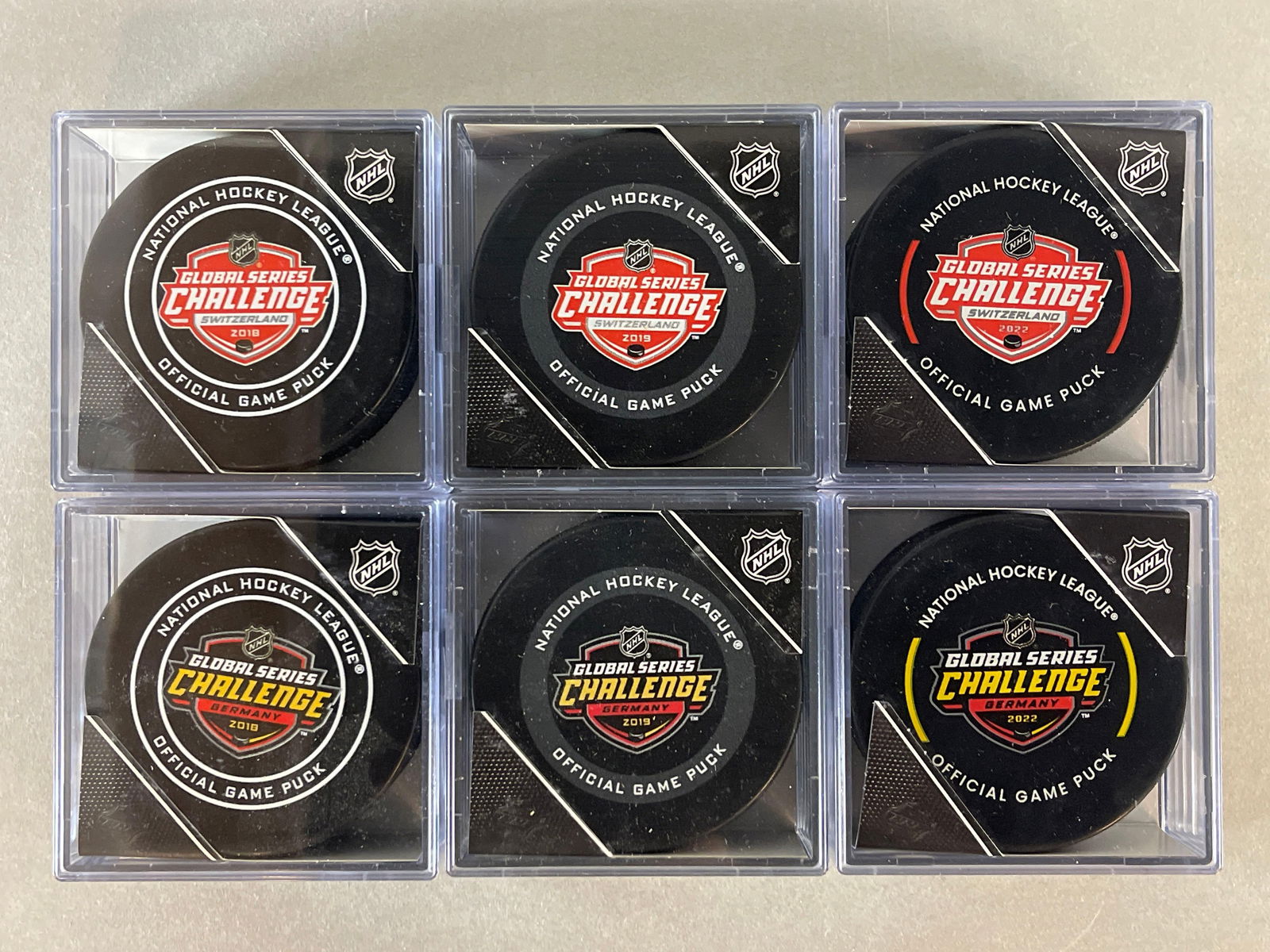 6 - 2018 - 22 NHL Global Series Challenge Official Game Pucks (1 of 4)