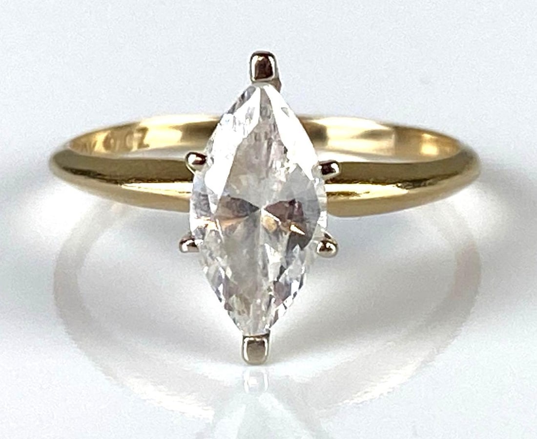 Gold 10K Gold CZ Ring: In-House Shipping Option: If you would like to use our in-house shipping service, please select “Arrange My Own Shipping” when paying your invoice. After payment, our in-house shipping team