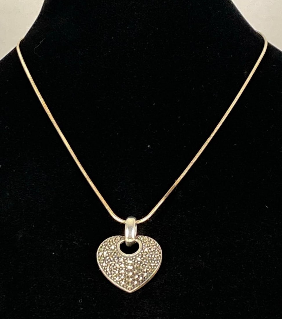 Sterling Silver Marcasite Heart Pendant Necklace: In-House Shipping Option: If you would like to use our in-house shipping service, please select “Arrange My Own Shipping” when paying your invoice. After payment, our in-house shipping team wi