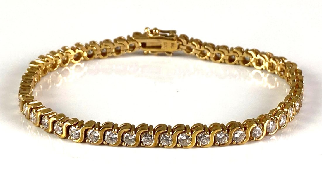 Gold Plated Sterling Silver CZ Bracelet: In-House Shipping Option: If you would like to use our in-house shipping service, please select “Arrange My Own Shipping” when paying your invoice. After payment, our in-house shipping team wi
