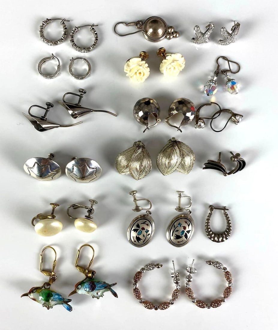 Group of Sterling Silver Earrings: In-House Shipping Option: If you would like to use our in-house shipping service, please select “Arrange My Own Shipping” when paying your invoice. After payment, our in-house shipping team