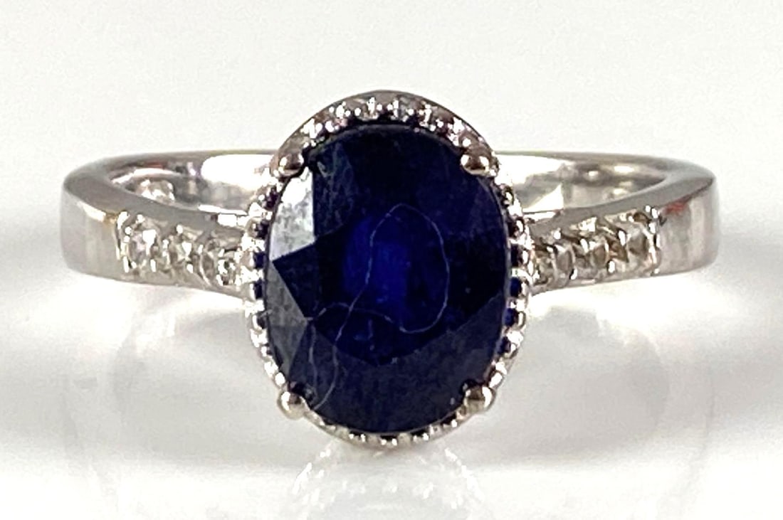 Sterling Silver Clear Topaz and Sapphire Ring: In-House Shipping Option: If you would like to use our in-house shipping service, please select “Arrange My Own Shipping” when paying your invoice. After payment, our in-house shipping team