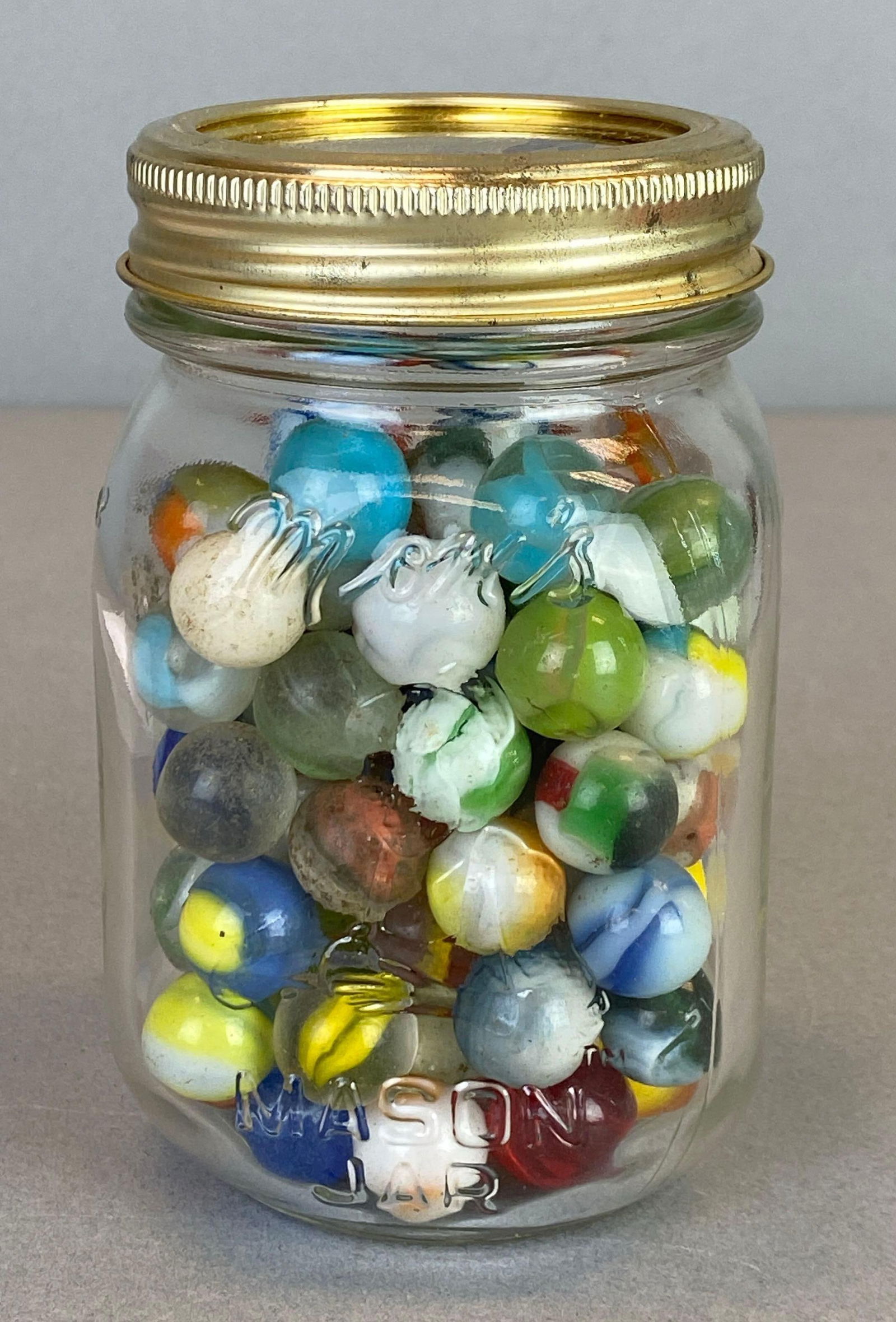 Glass Jar of Assorted Glass Marbles: In-House Shipping Option: If you would like to use our in-house shipping service, please select “Arrange My Own Shipping” when paying your invoice. After payment, our in-house shipping team wi