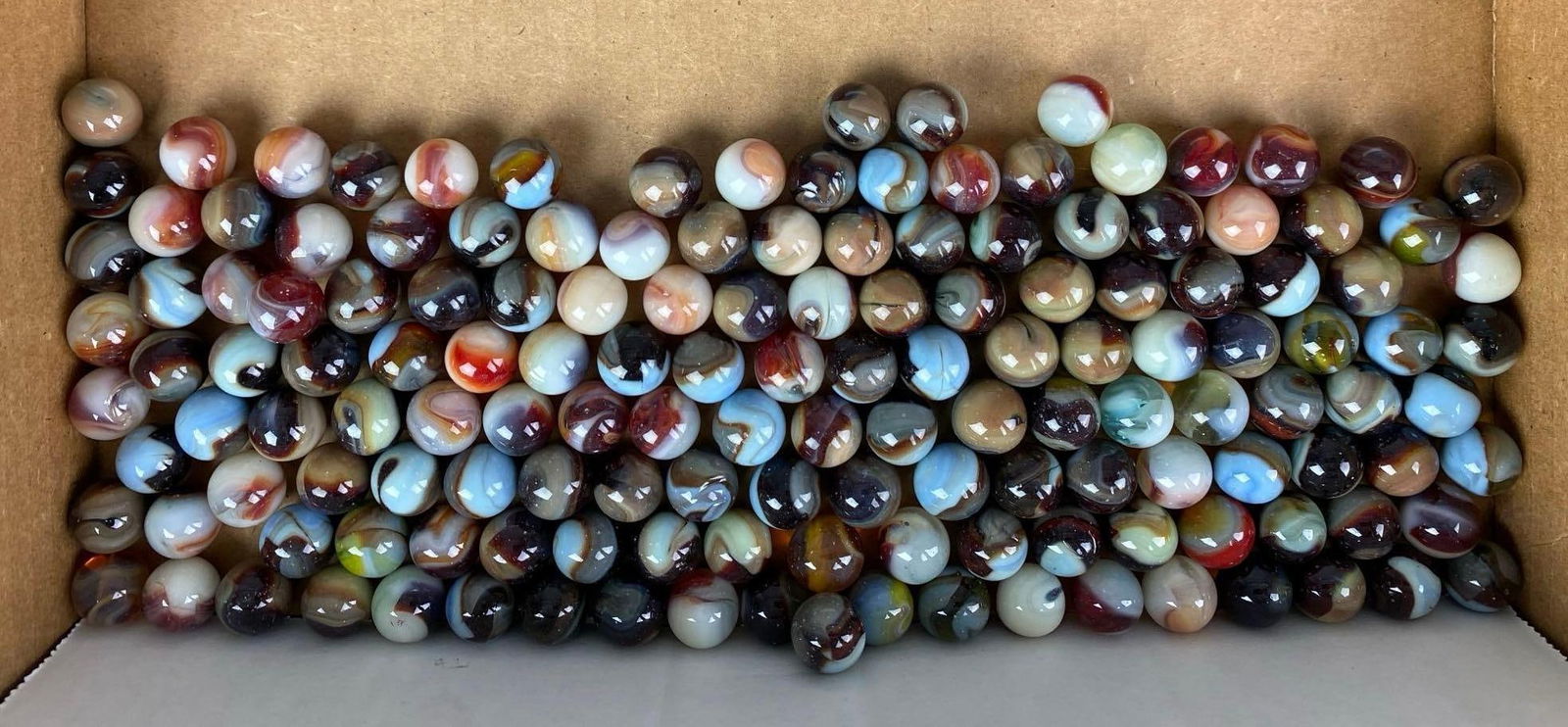 Group of 140+ Jabos Glass Marbles: In-House Shipping Option: If you would like to use our in-house shipping service, please select “Arrange My Own Shipping” when paying your invoice. After payment, our in-house shipping team wi
