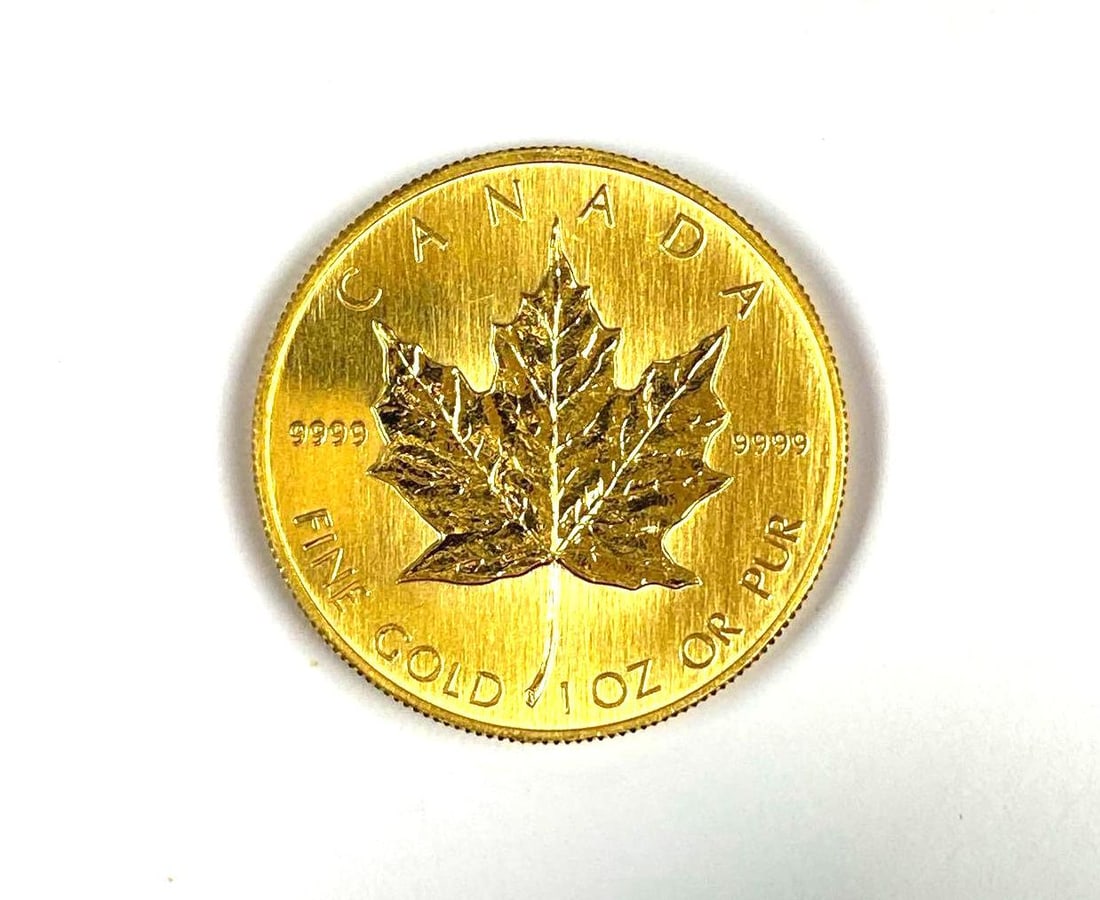 1985 Canada $50 Maple Leaf 1 oz 9999 Fine Gold Coin (1 of 2)