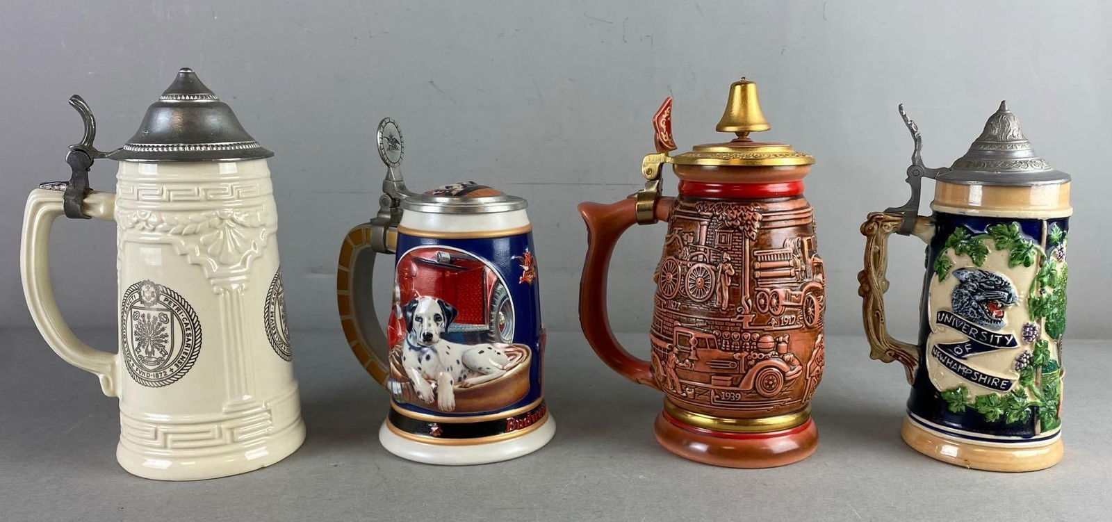 Group of 4 Ceramic Beer Steins (1 of 3)