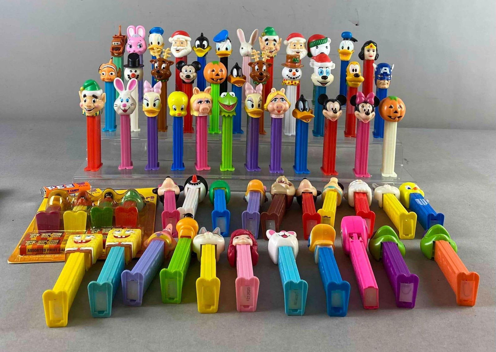 Group of Assorted Vintage Pez Dispensers: In-House Shipping Option: If you would like to use our in-house shipping service, please select “Arrange My Own Shipping” when paying your invoice. After payment, our in-house shipping team wi