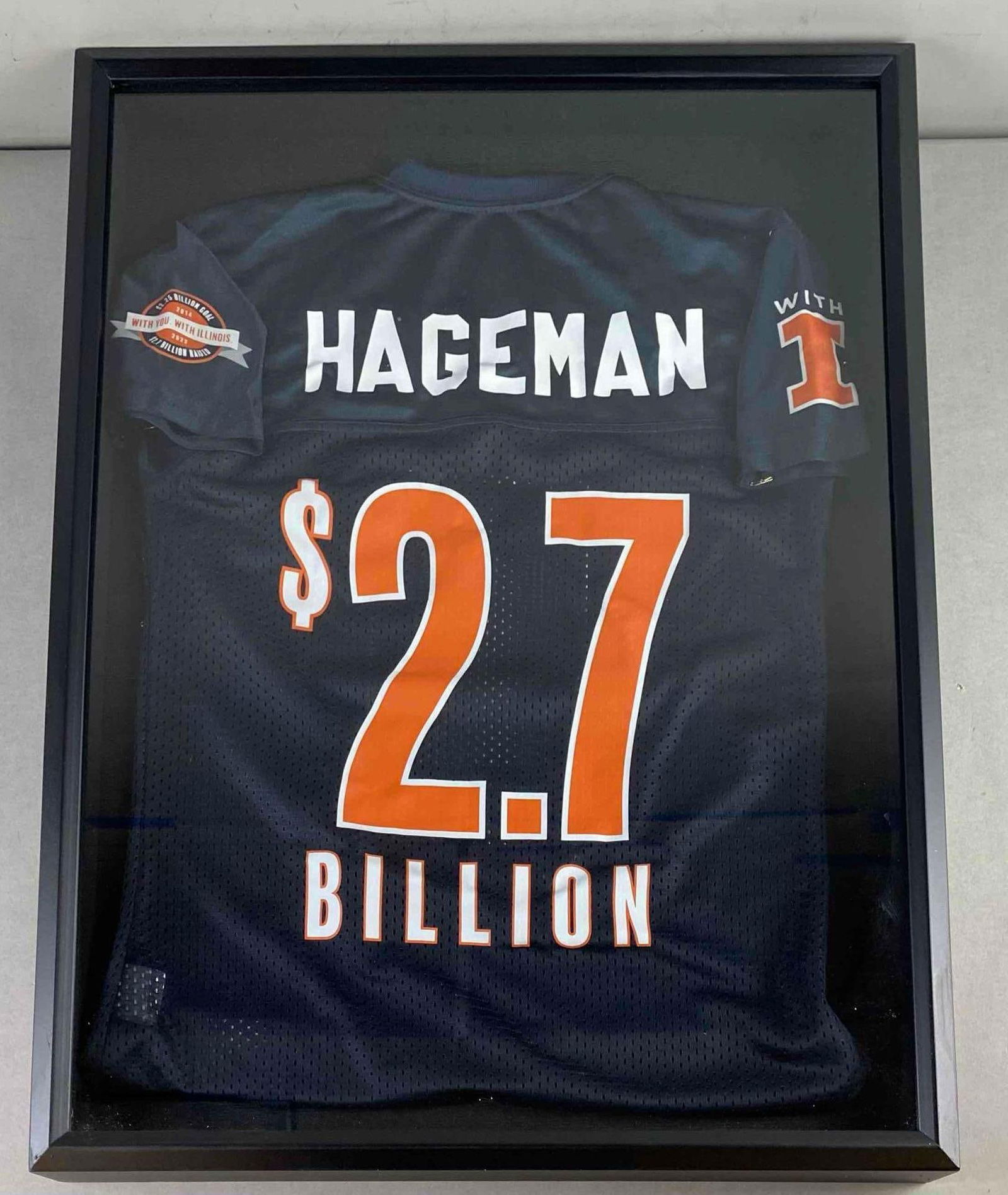 2022 University of Illinois $2.7 Billion Raised Jersey in Shadow Box Frame: In-House Shipping Option: If you would like to use our in-house shipping service, please select “Arrange My Own Shipping” when paying your invoice. After payment, our in-house shipping team wi