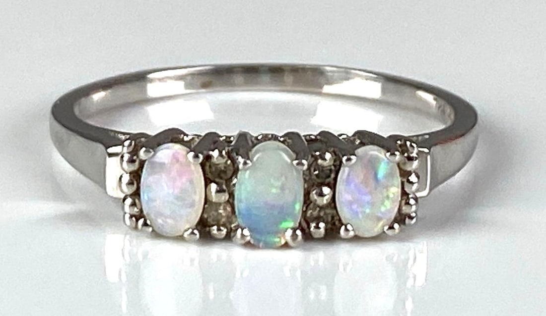 Signed TNL 10K White Gold Diamond Opal Ring: In-House Shipping Option: If you would like to use our in-house shipping service, please select “Arrange My Own Shipping” when paying your invoice. After payment, our in-house shipping team wi