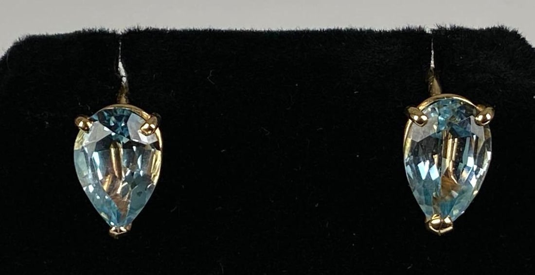 Pair of 14K Yellow Gold Teardrop Blue Topaz Clip Earrings: In-House Shipping Option: If you would like to use our in-house shipping service, please select “Arrange My Own Shipping” when paying your invoice. After payment, our in-house shipping team