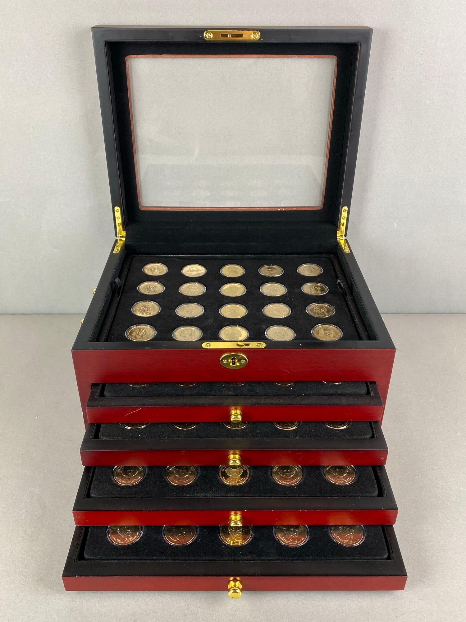 Group of 100 US Presidential Golden Dollars in a Display Case: In-House Shipping Option: If you would like to use our in-house shipping service, please select “Arrange My Own Shipping” when paying your invoice. After payment, our in-house shipping team wi
