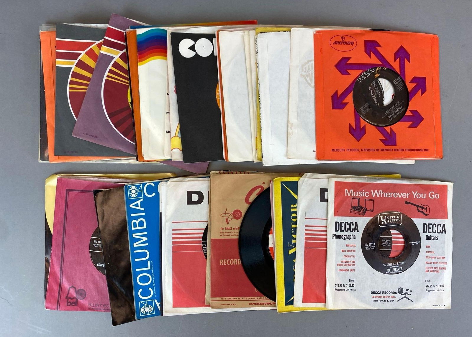 Group of Assorted 45 RPM Vinyl Records: In-House Shipping Option: If you would like to use our in-house shipping service, please select “Arrange My Own Shipping” when paying your invoice. After payment, our in-house shipping team wi